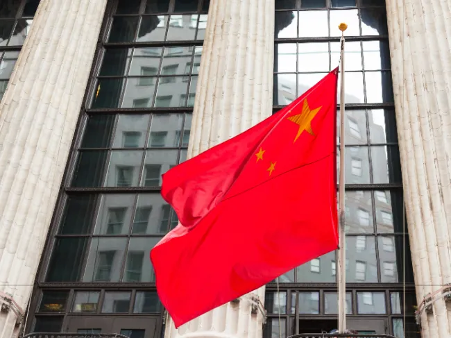 chinese flag in front of government building